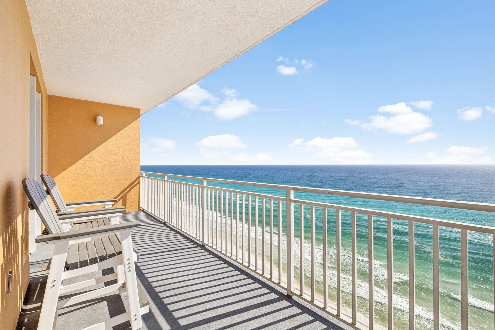Step onto your private beachfront balcony and breathe in the ocean breeze while lounging in comfortable chairs overlooking endless turquoise waters.