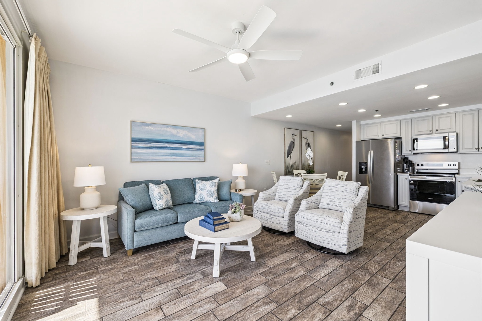Settle into your bright, open living space with coastal touches and a fully equipped kitchen ready for your getaway.