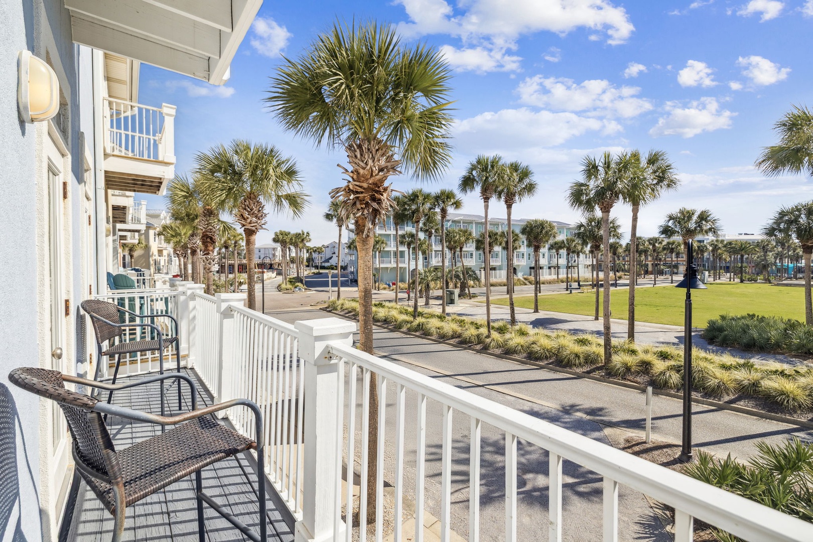 Step onto your private balcony and soak up stunning views of swaying palms and manicured grounds stretching toward the horizon.