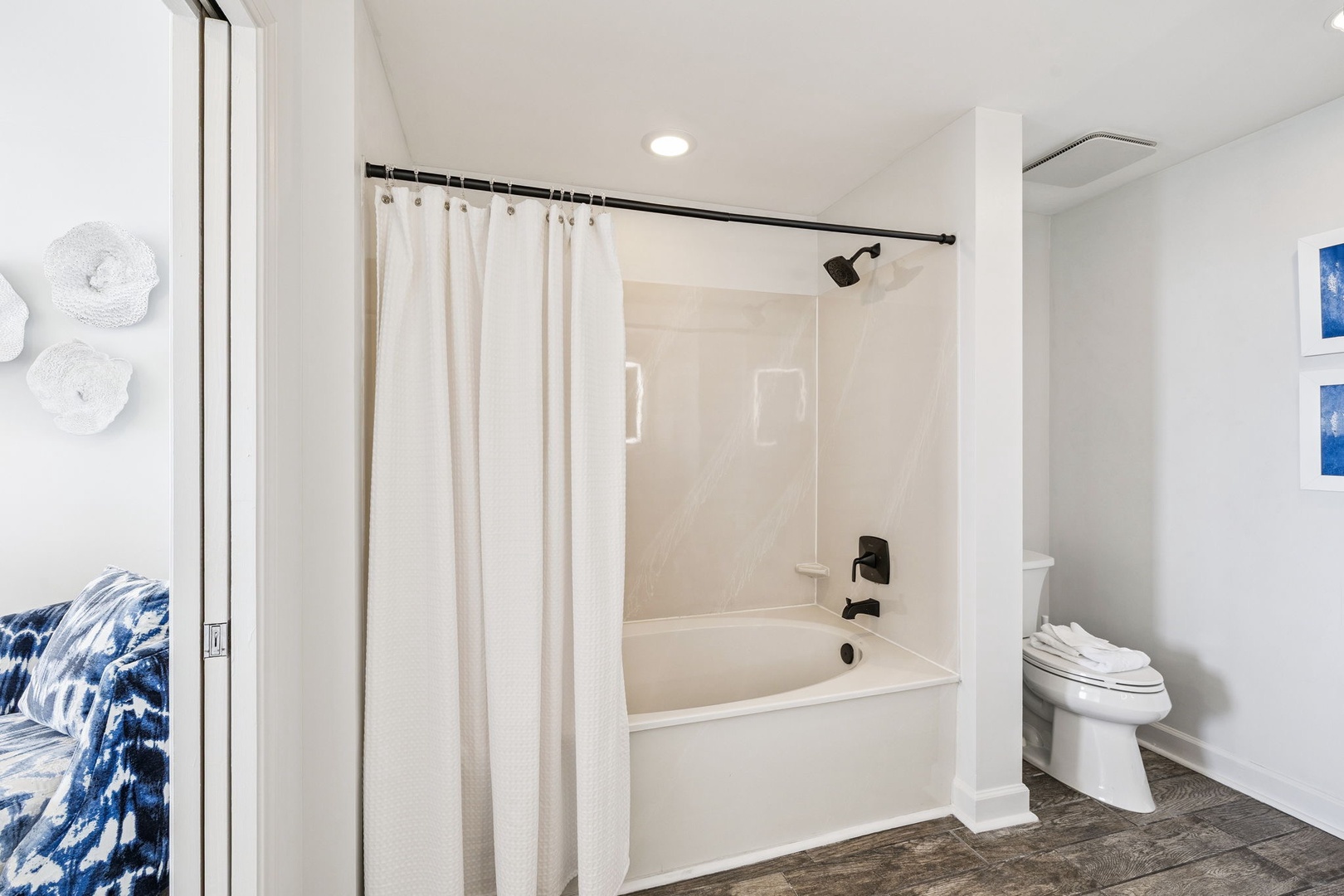 Unwind in your pristine bathroom with a deep soaking tub, perfect for relaxing after your adventures.