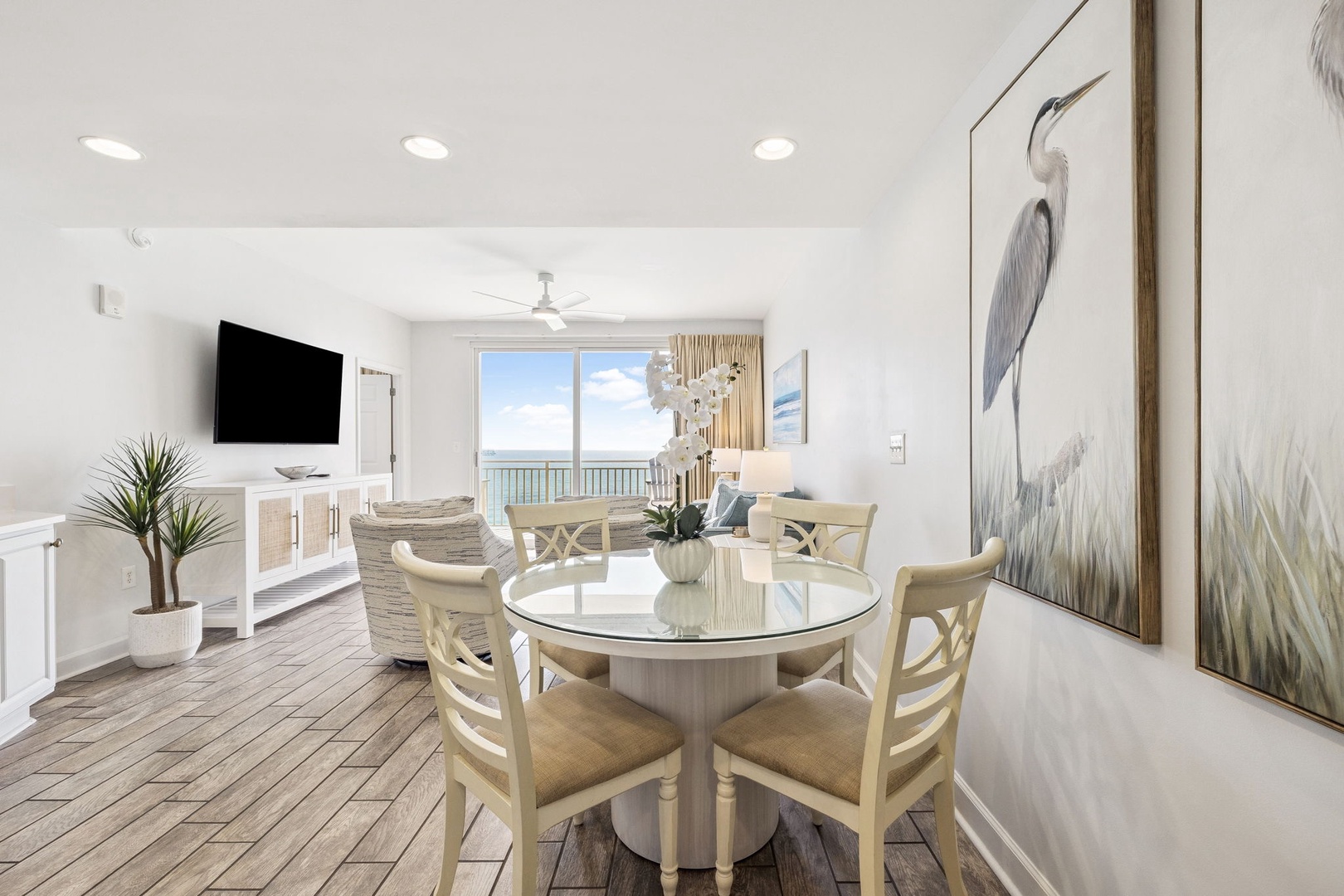 Step into your bright coastal retreat where ocean views greet you from every angle, perfect for memorable meals together.