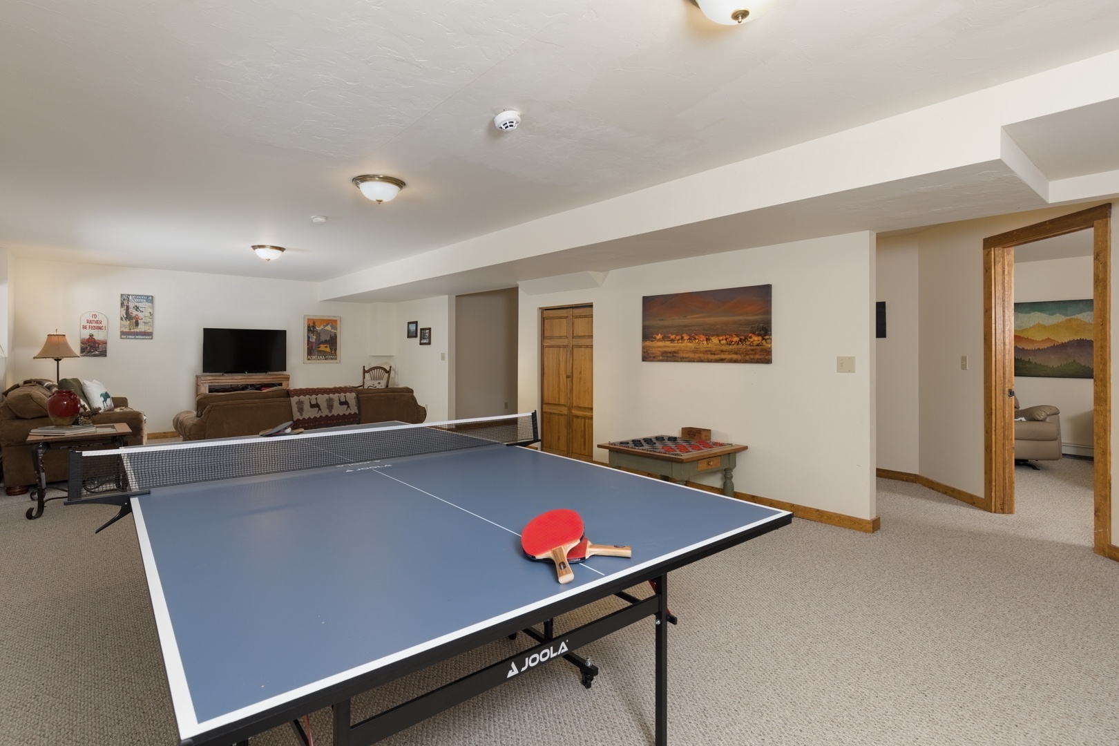Challenge friends to table tennis in your spacious game room, complete with comfortable seating and entertainment for hours of fun.