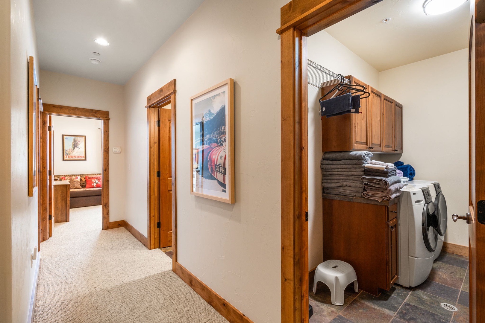 Your private laundry nook keeps everything organized with plentiful storage, fresh towels, and modern appliances for effortless mountain vacation living.