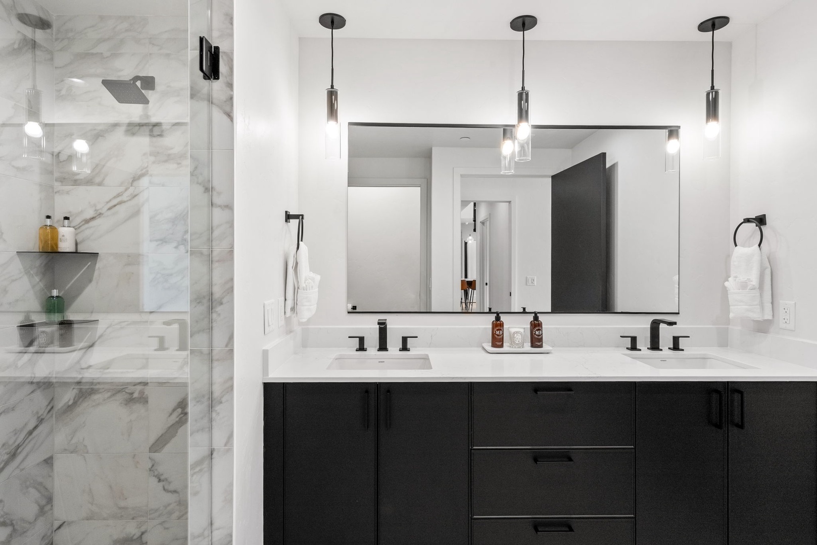 Step into your luxurious spa-like bathroom with elegant marble details, double vanity, and sleek modern fixtures that elevate your daily routine into something extraordinary.