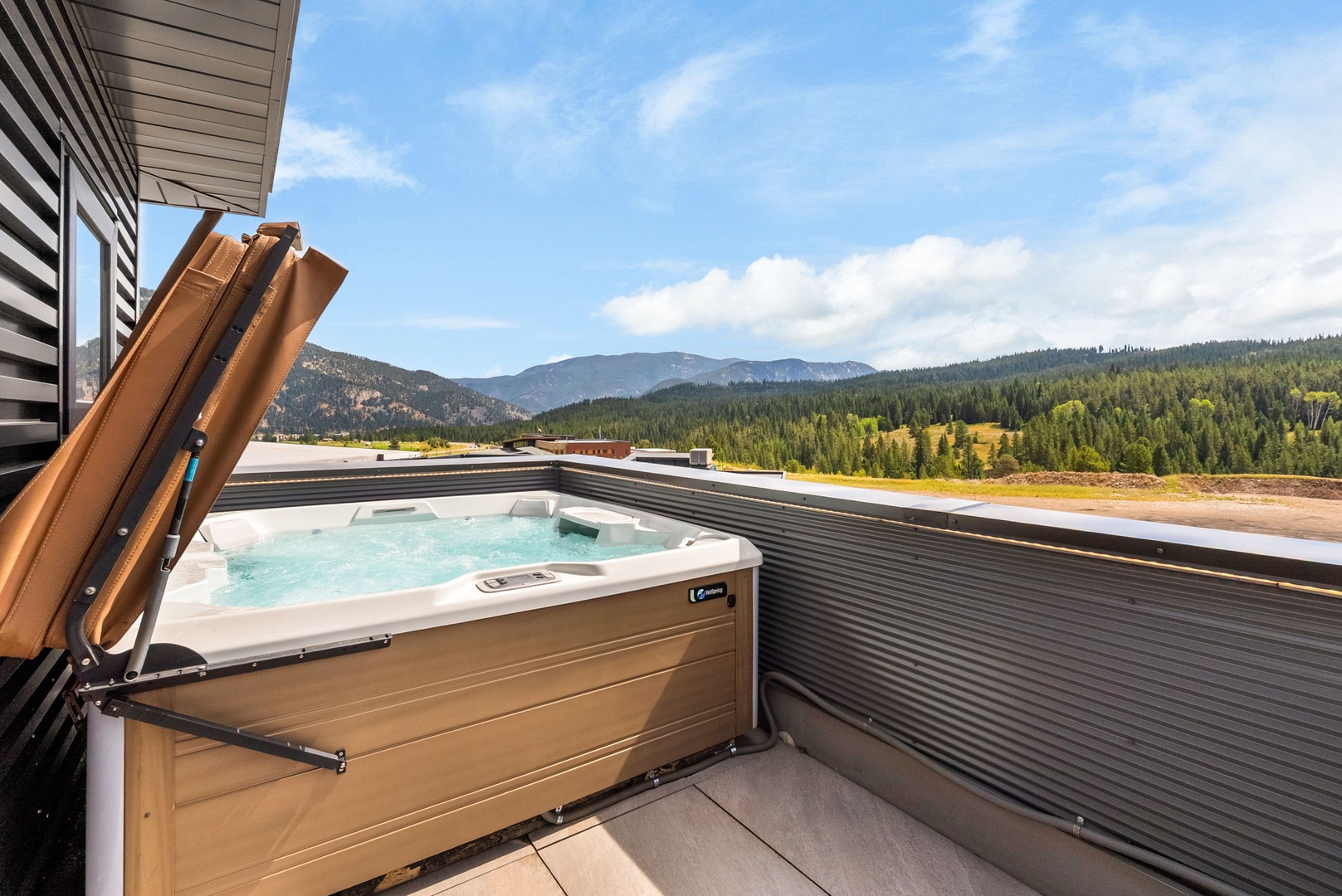 Soak your cares away in your private hot tub while drinking in sweeping mountain views and pristine forest scenery stretching to the horizon.