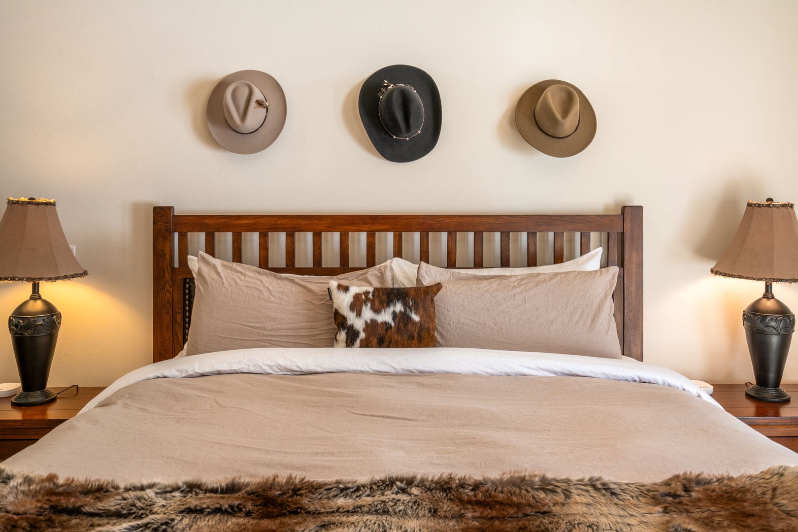 Your cozy western-themed bedroom awaits with rustic charm and comfortable linens for peaceful nights.