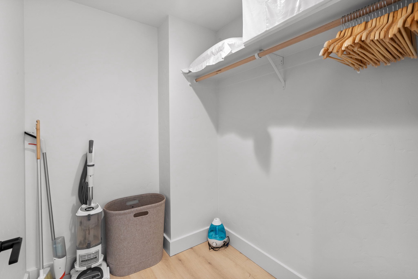 Your private walk-in closet offers ample hanging space and storage, keeping your belongings organized during your stay.