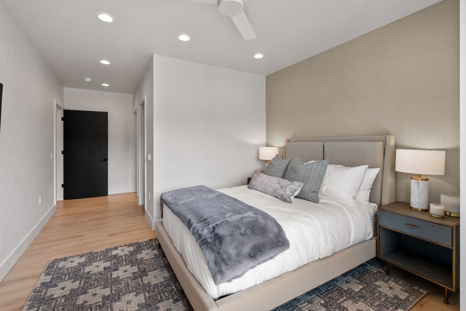 Slip into your comfortable bed after a full day, surrounded by calming neutral tones and soft lighting that make winding down feel effortless.