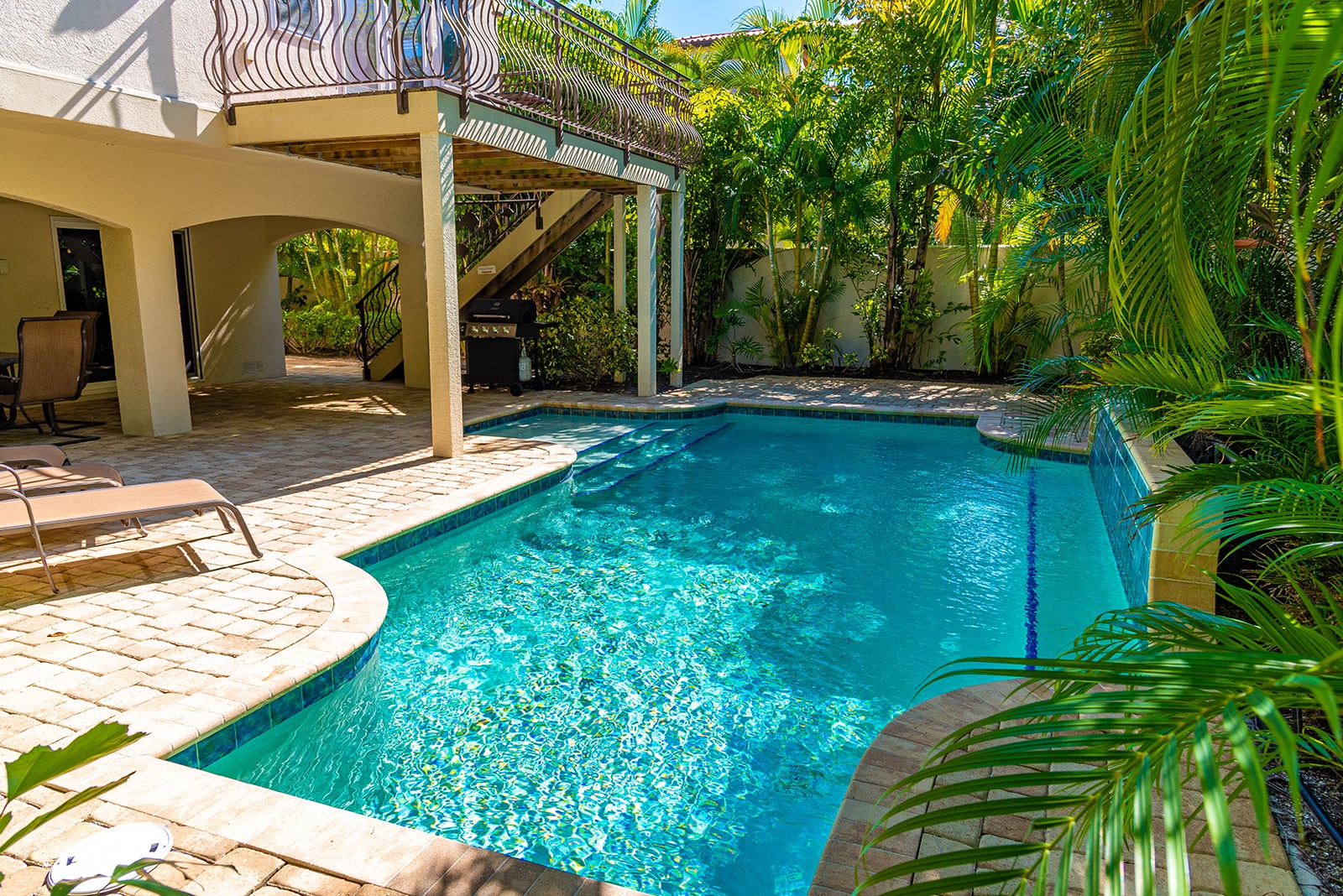 Large Pool with Tropical landscape surrounding it