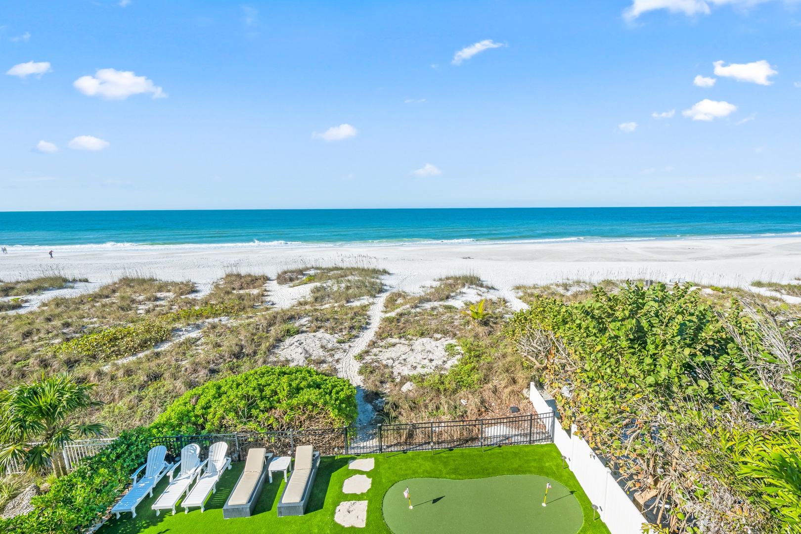 Private Putting Green and Beach access