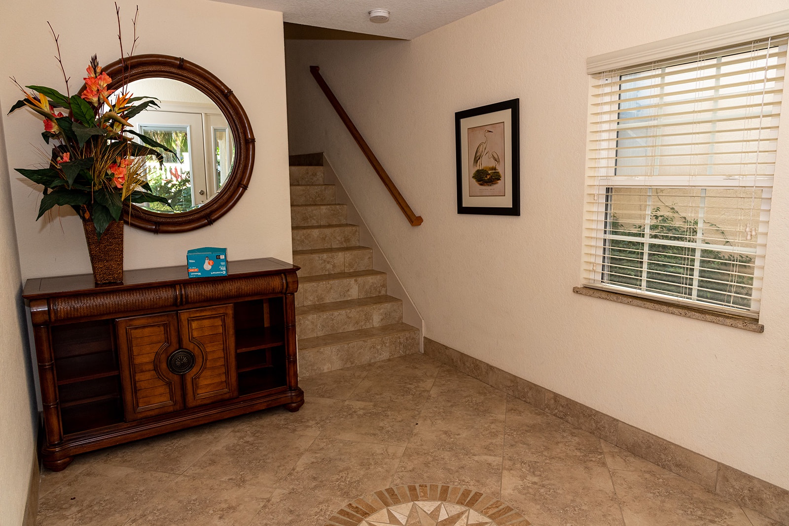 Main Foyer with access upstairs, the game room or pool