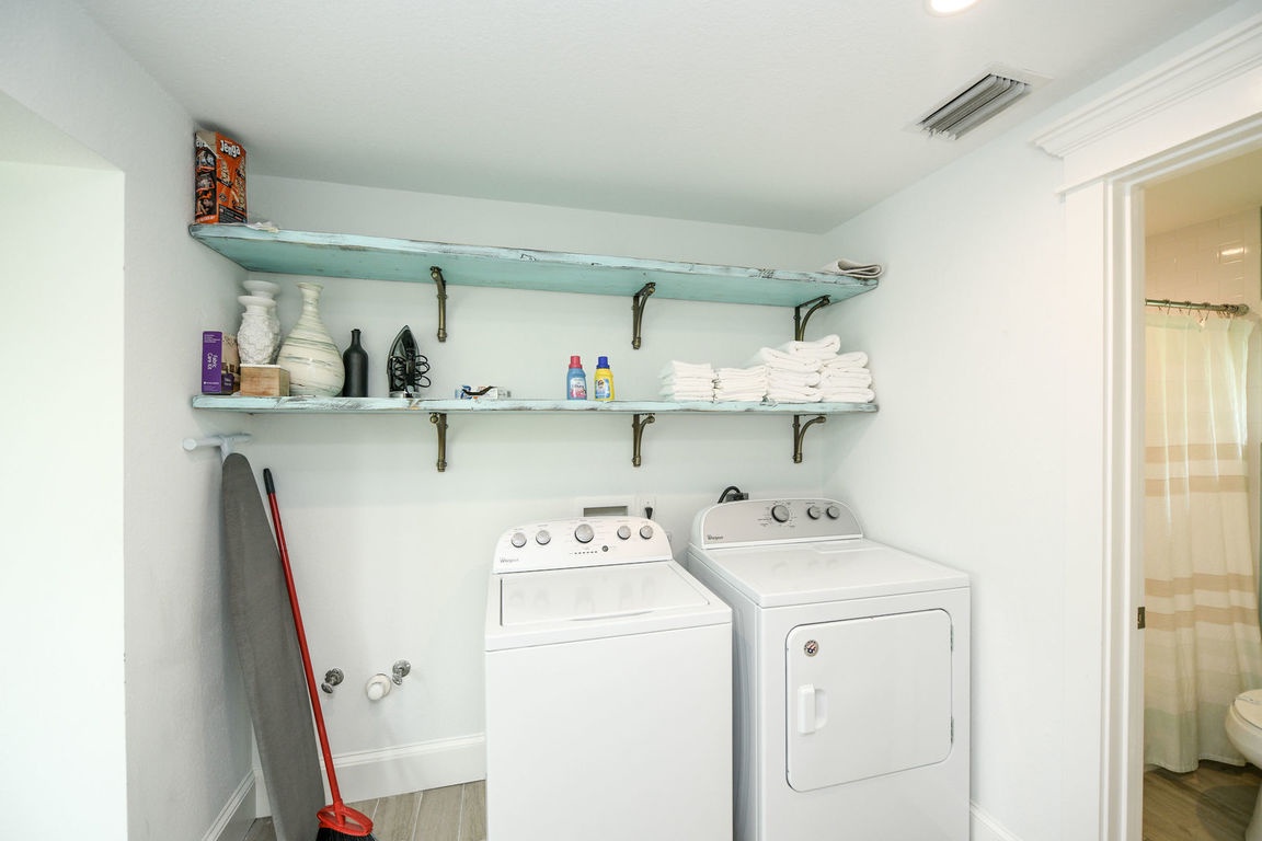Laundry Room with Washer and Dryer, Beachfront Bungalow - AMI Locals