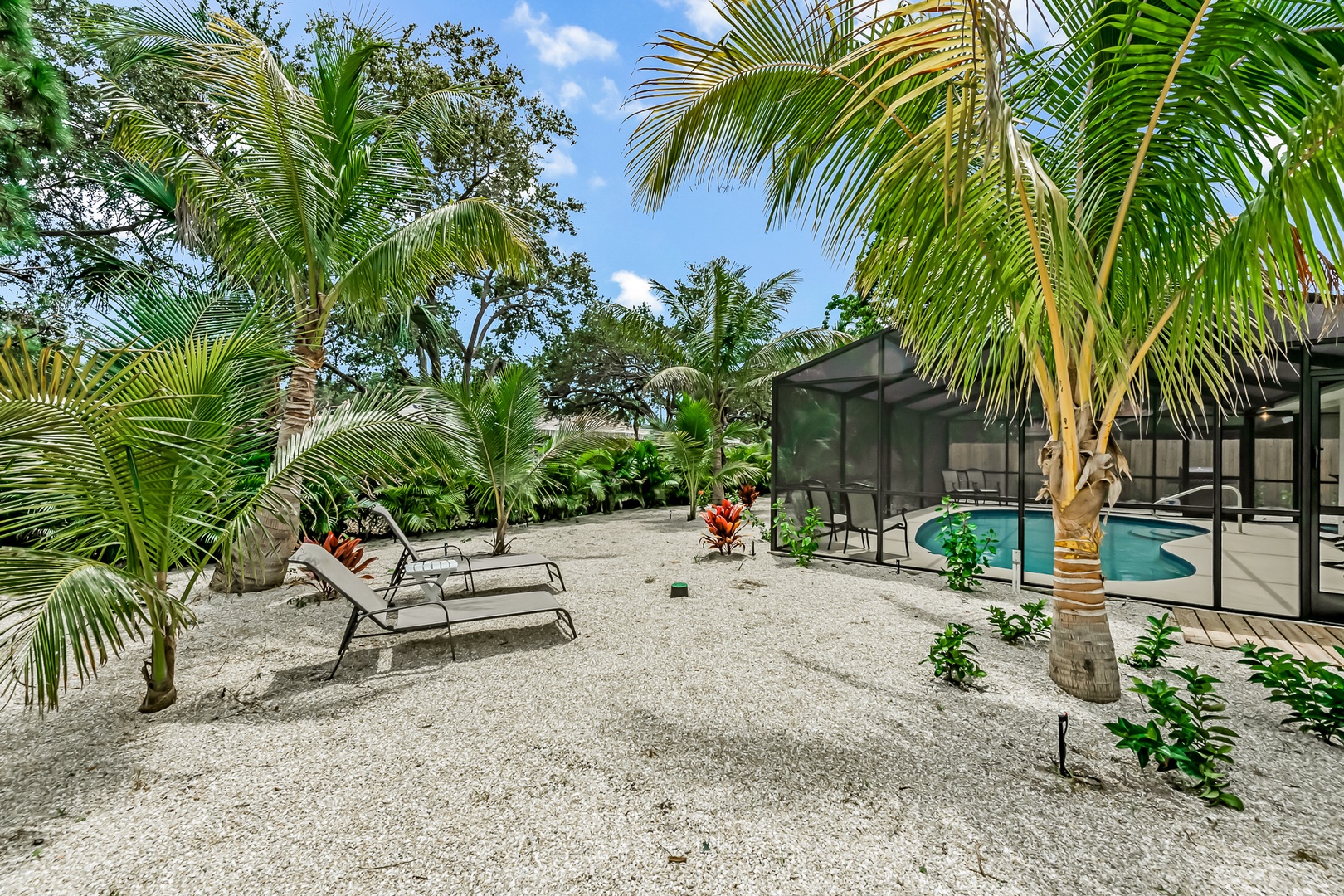 Secluded Backyard with Loungers