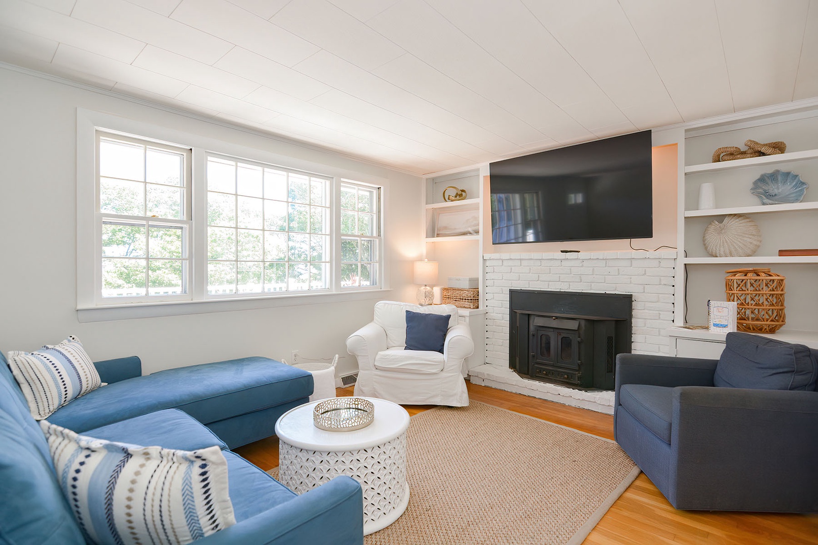 Living room with a TV and sofa.