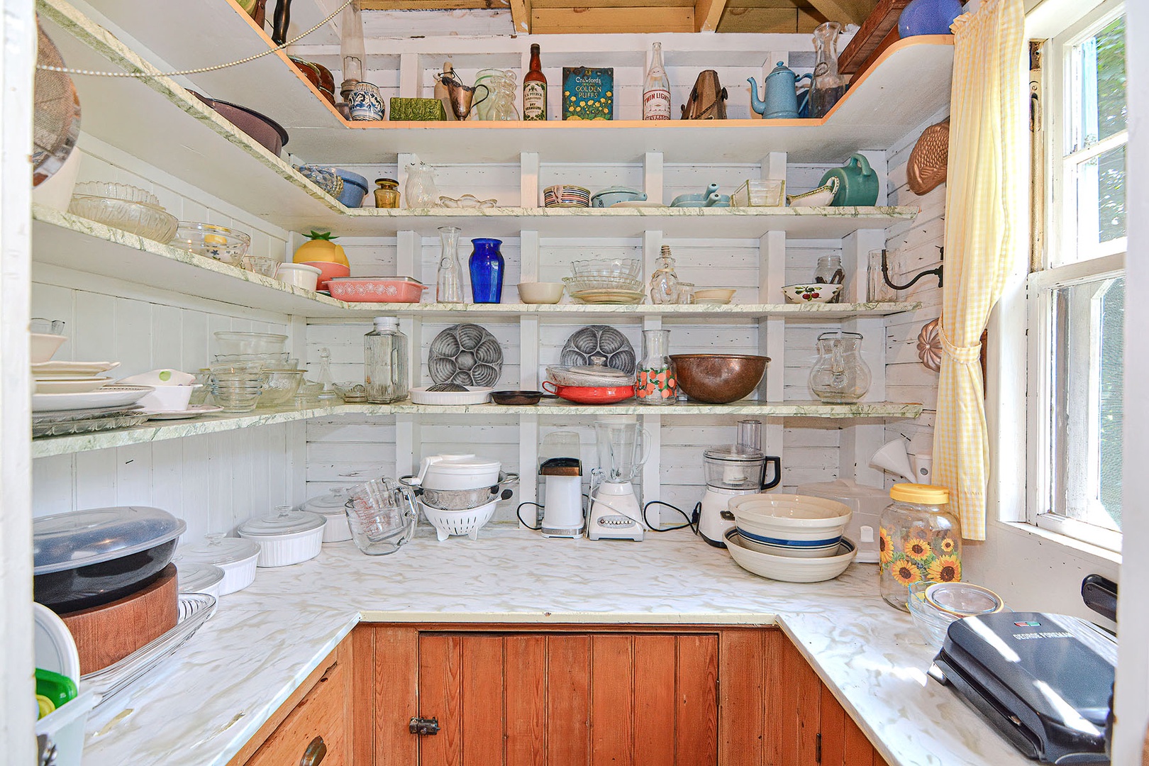 A Butler's Pantry full of kitchenware.