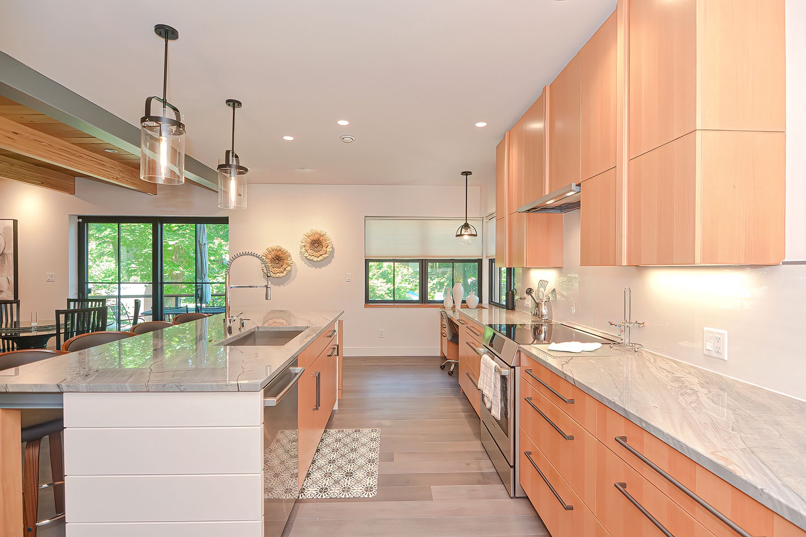 The center island features the sink, dishwasher, and plenty of prep space.