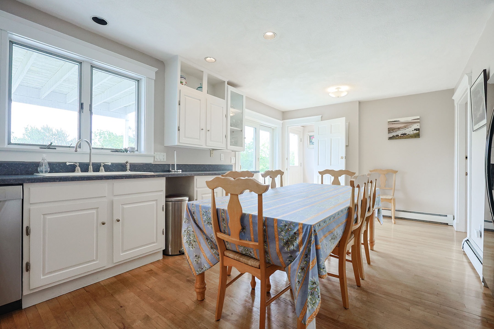 The large eat-in kitchen is a natural gathering spot.
