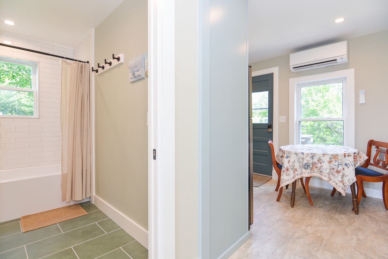 The full bathroom is located just off the dining area.