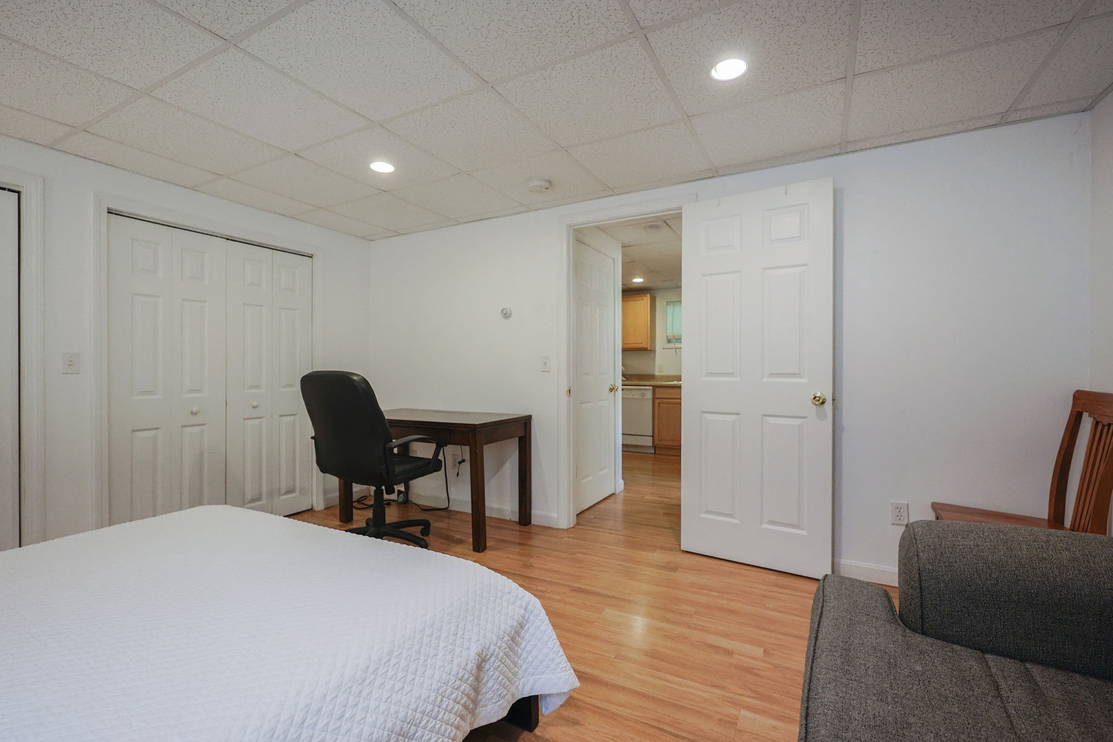 Garden level bedroom includes a convenient work desk
