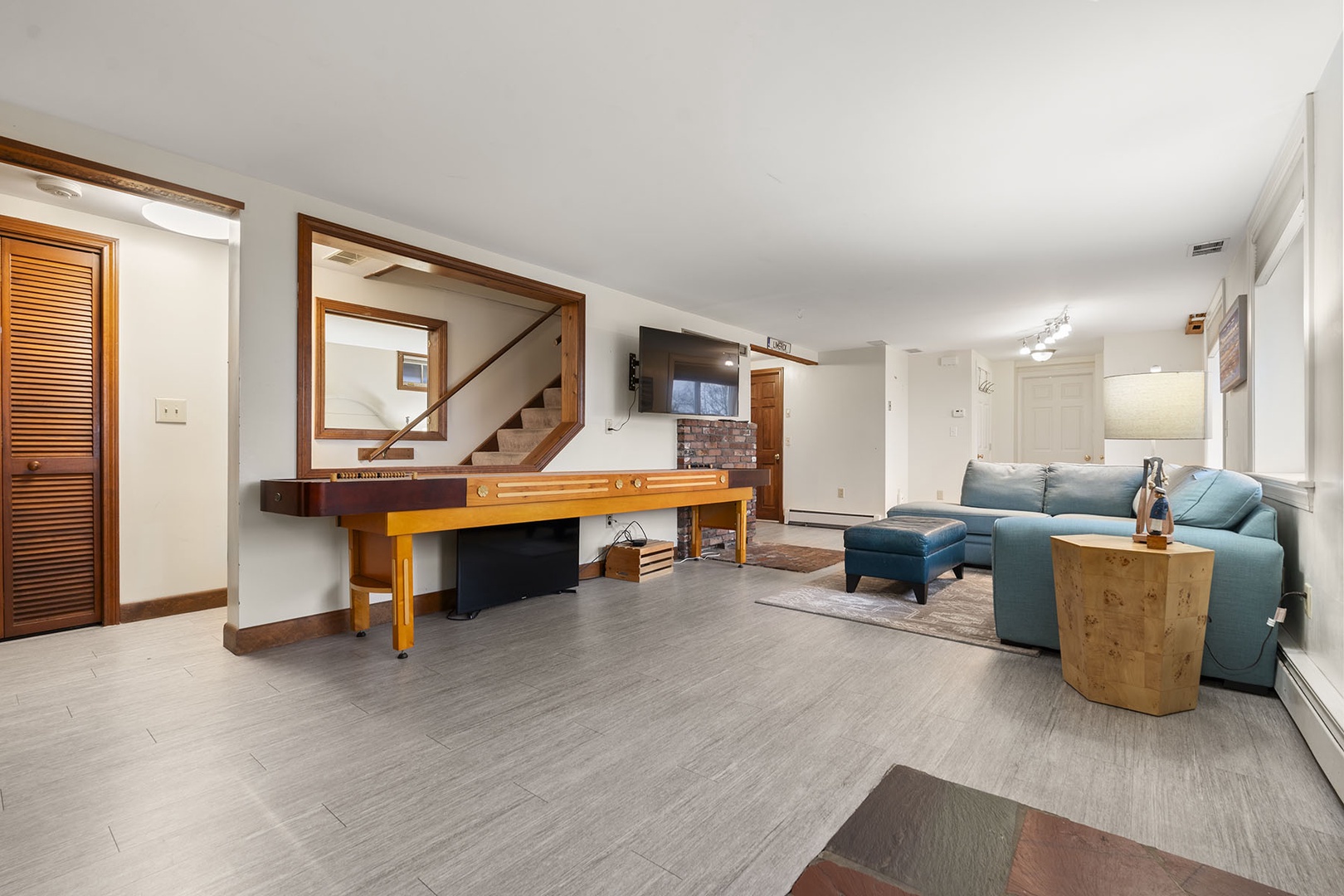 The lower floor offers another open plan living room with ample space.