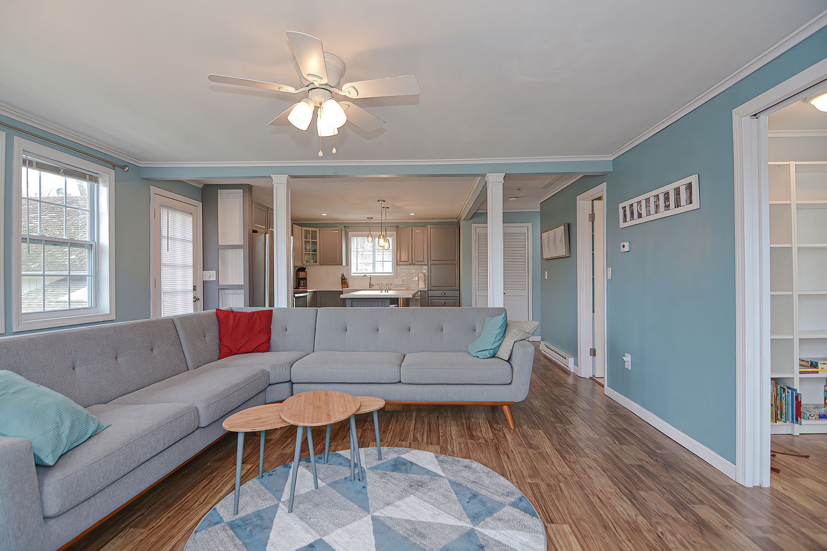 The open plan living room opens to the kitchen.