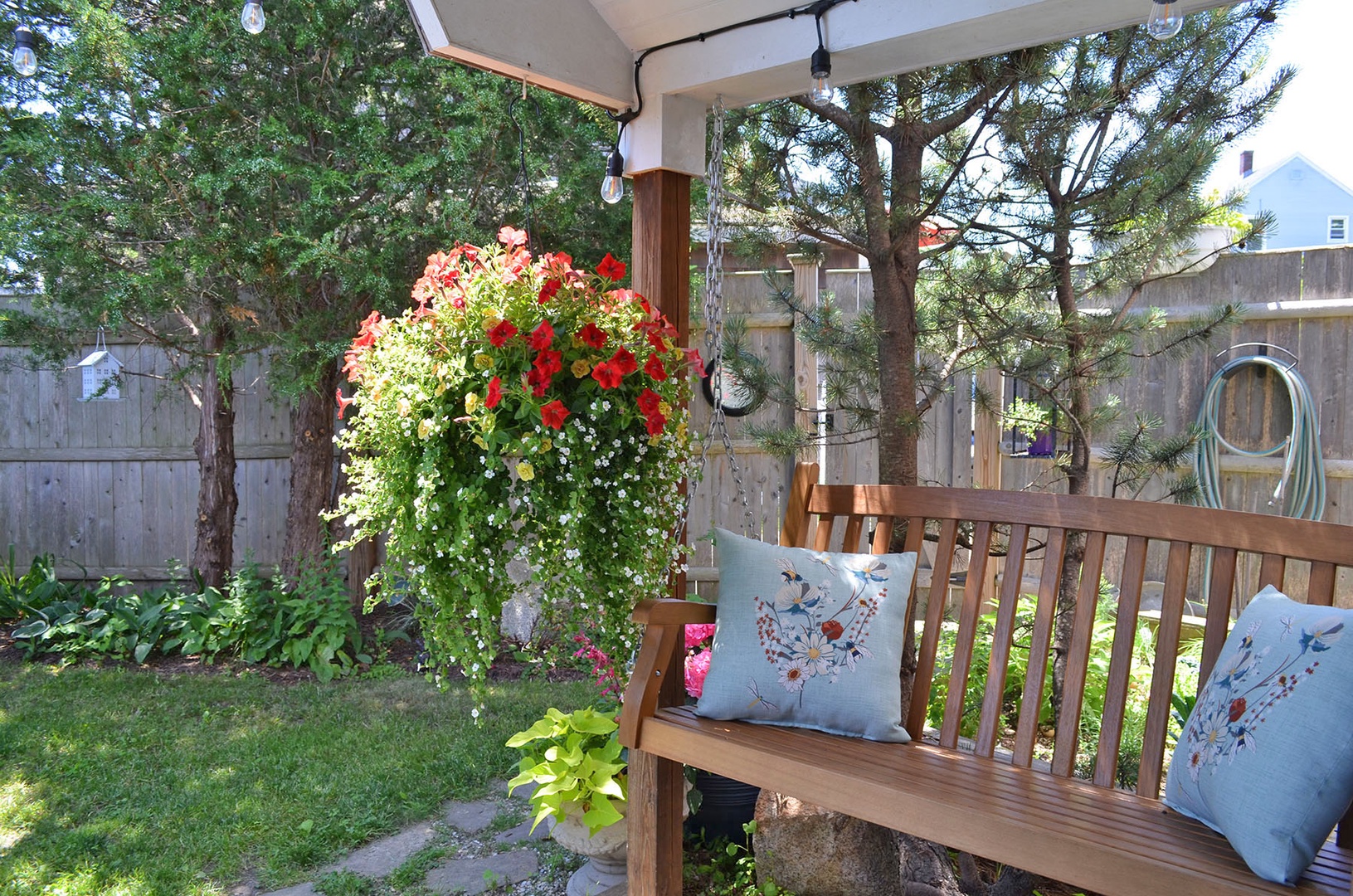 The porch swing and private garden at Jewel Box.