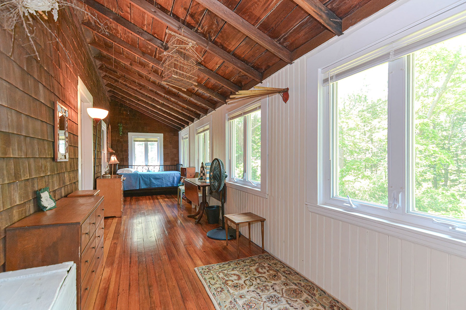 Sun porch contains a Queen and a Twin bed.