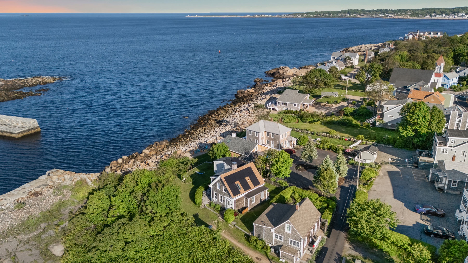 Watch the boats go by in Pigeon Cove.