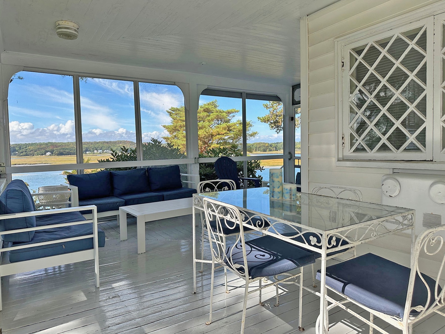 The large wraparound porch offers river views.