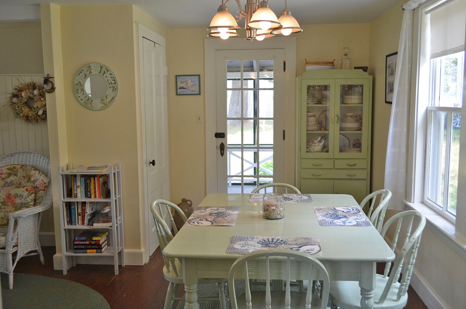 There is access to the screened porch from the dining room.