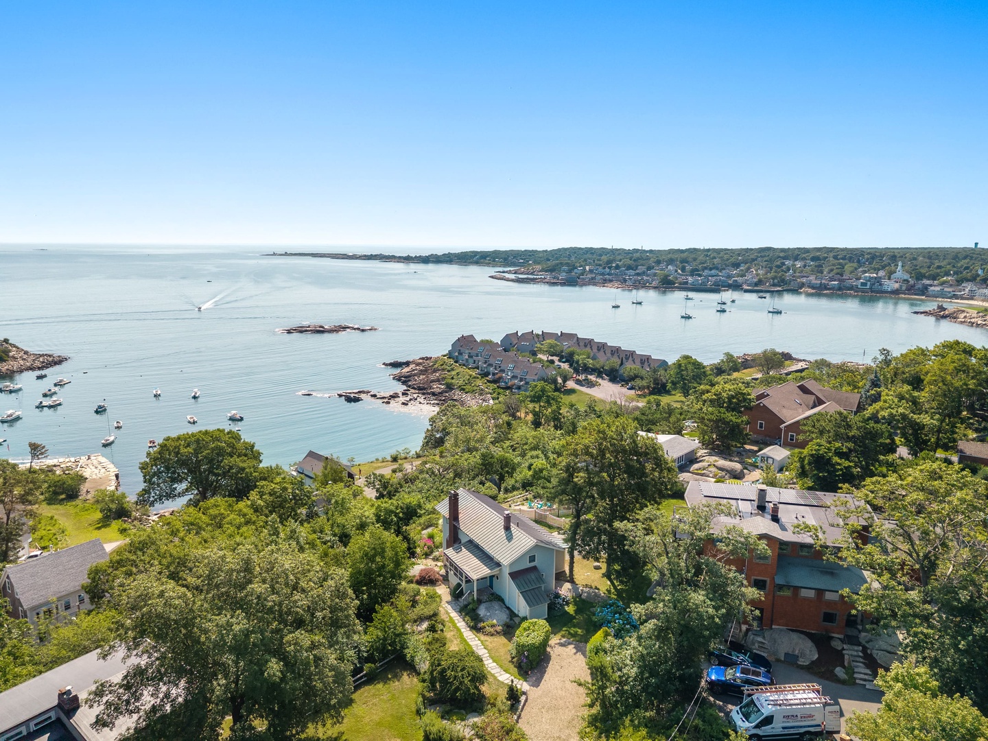 Aerial view of the house and Sandy Bay.