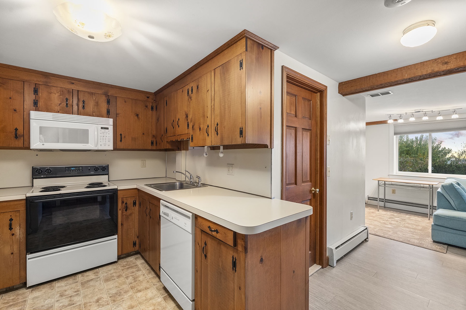 This kitchen offers ample storage and counter space.