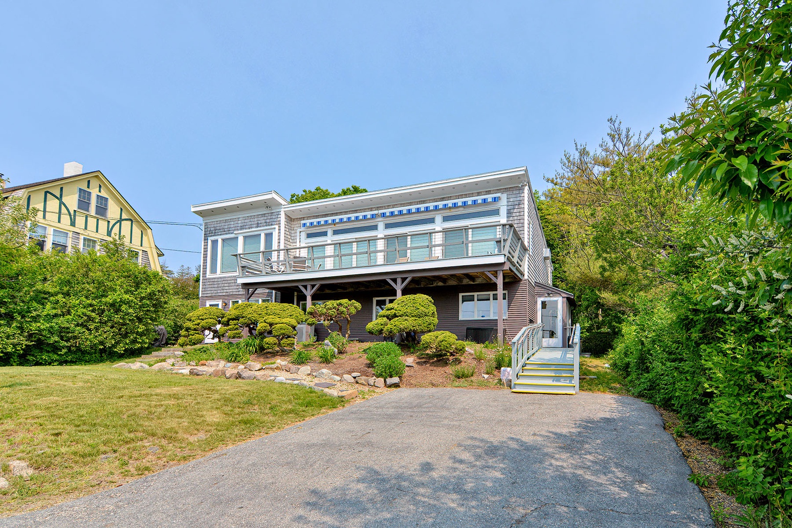 The house and driveway.