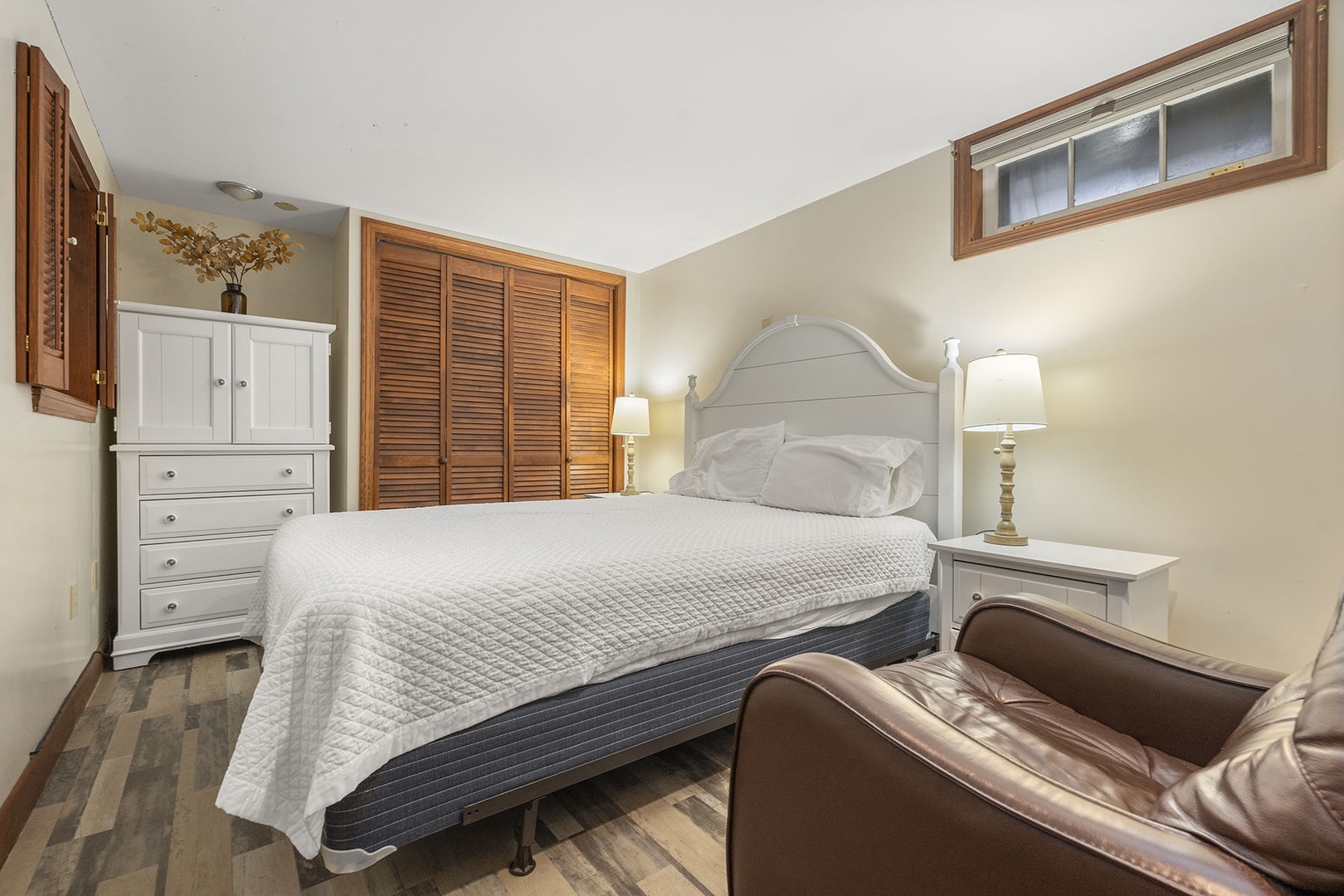 Bonus room with a queen bed on the lower floor.