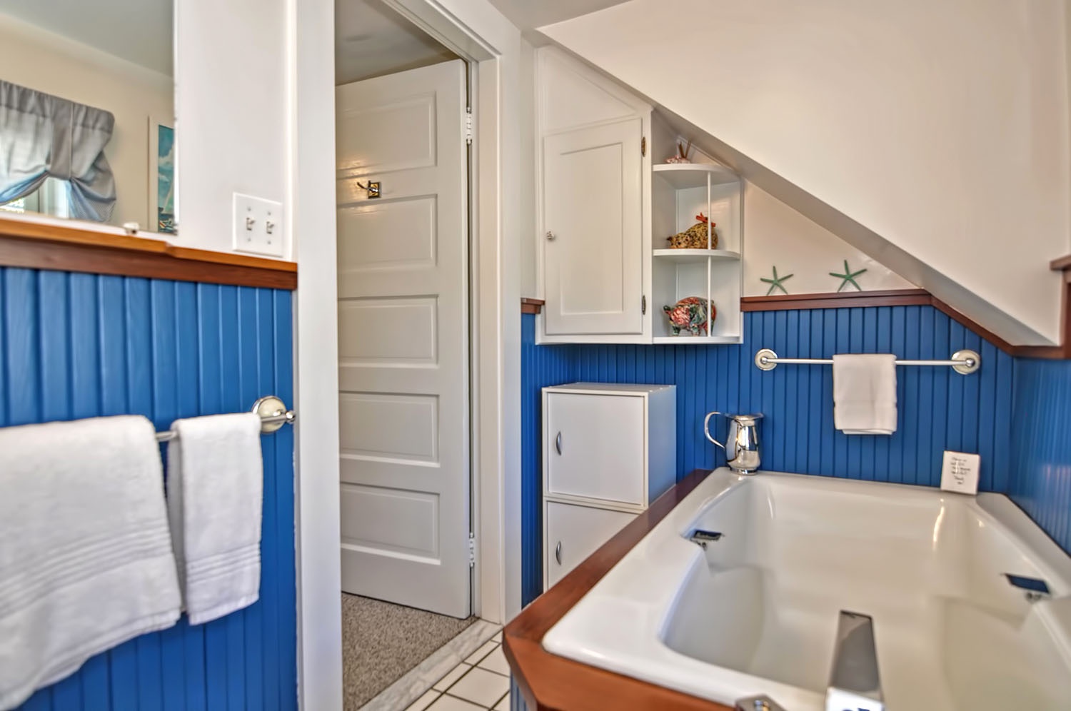 The second floor full bath has a large soaking tub (no shower).