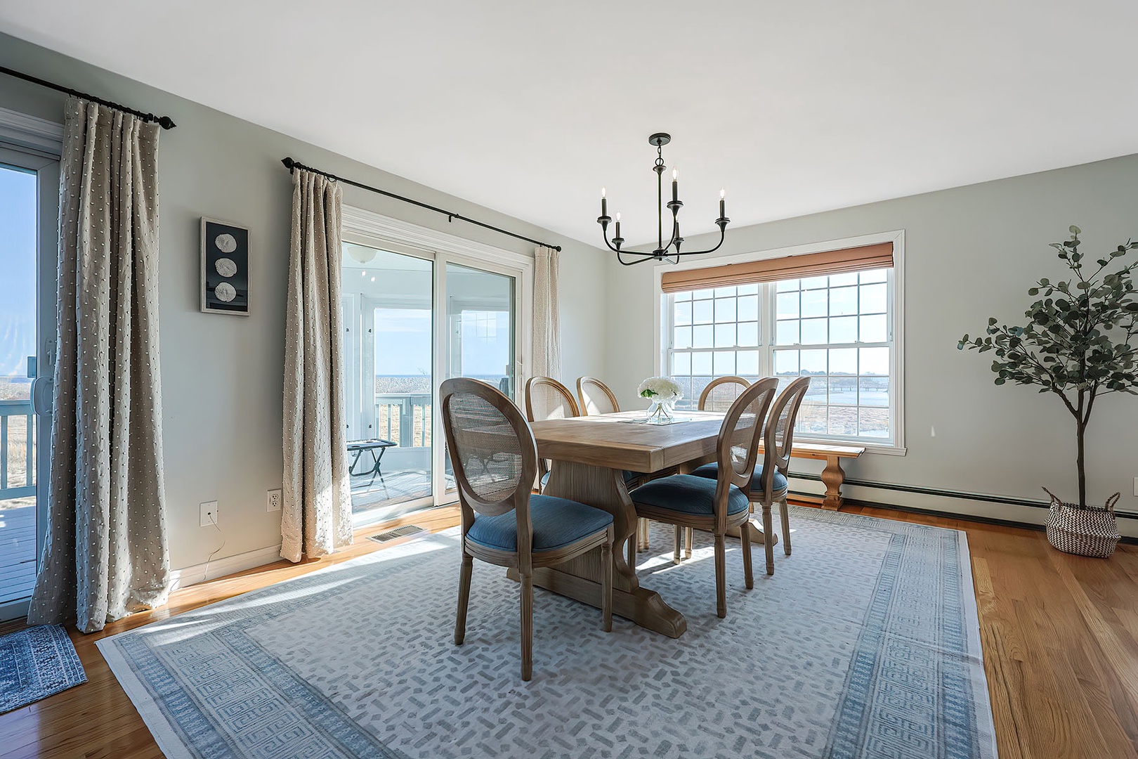 Dining area next to the kitchen and porch.