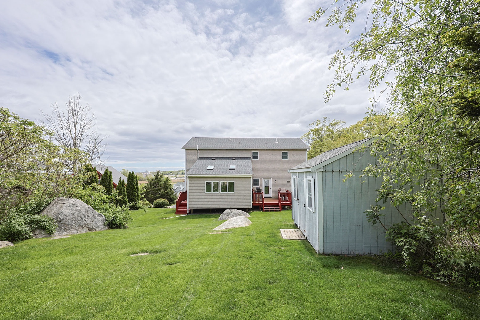 The large lush green backyard