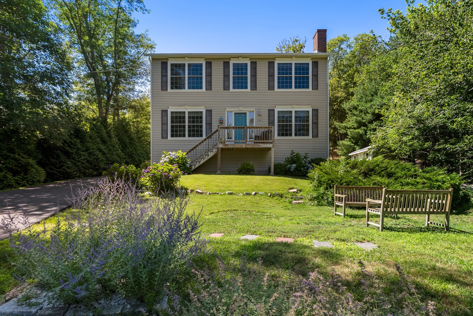 Front of the house and the frontyard.