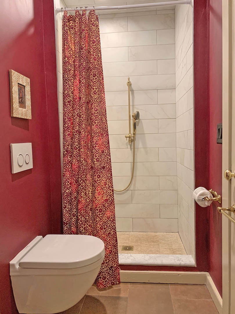 The tiled walk-in shower.
