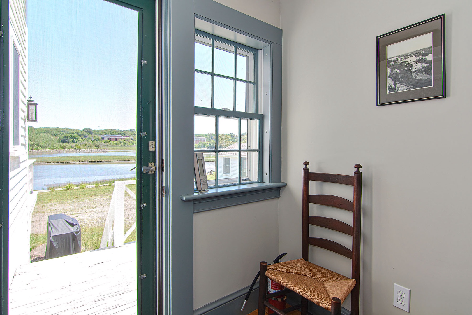 Main entrance hall also leads to the back deck.