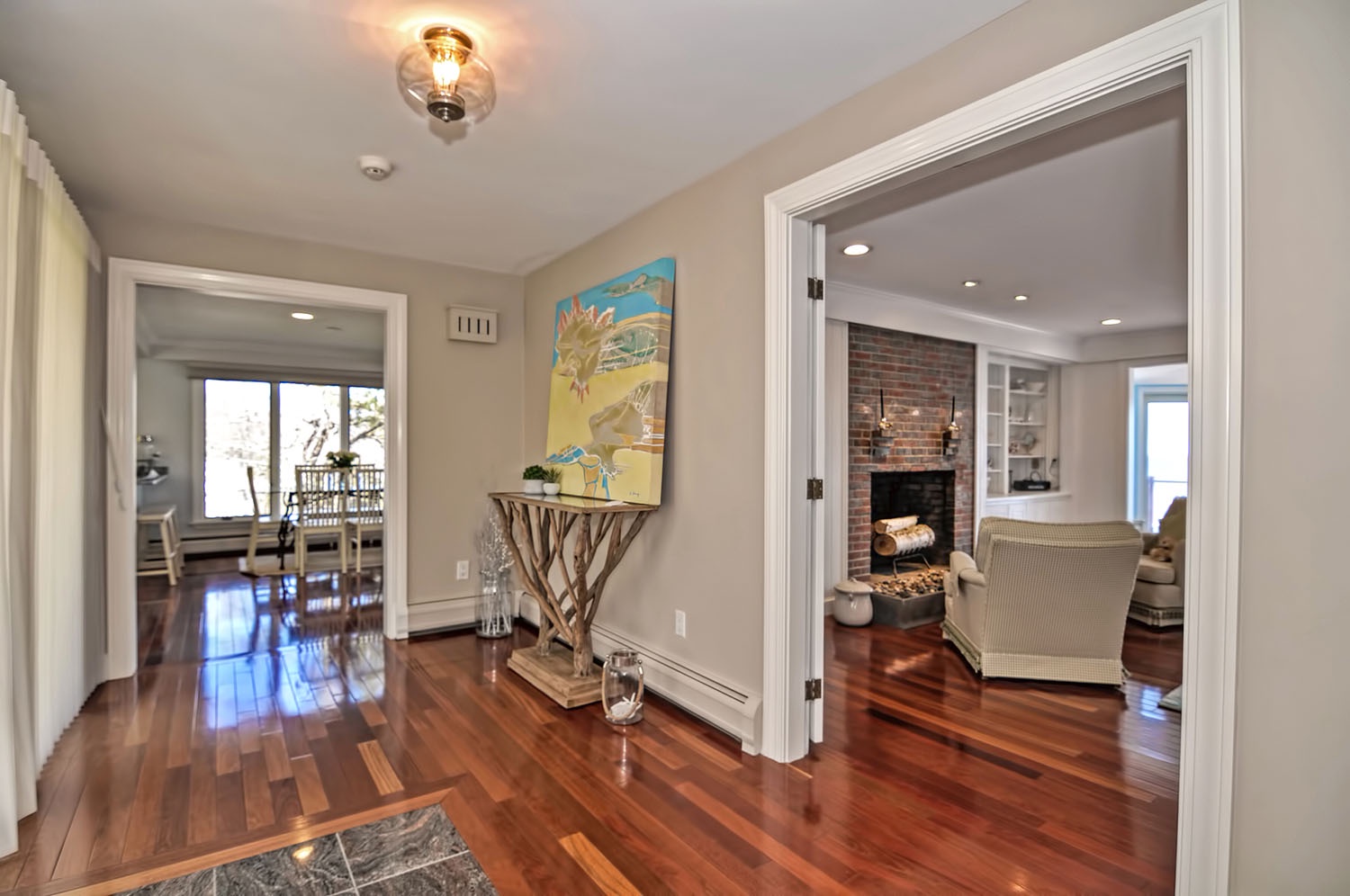 The front hall, with views into the dining room and parlor.