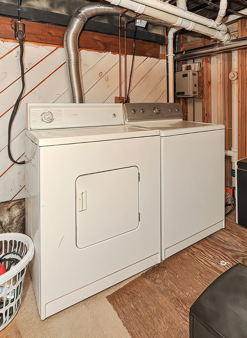 The laundry area is accessed through the garden-level suite.