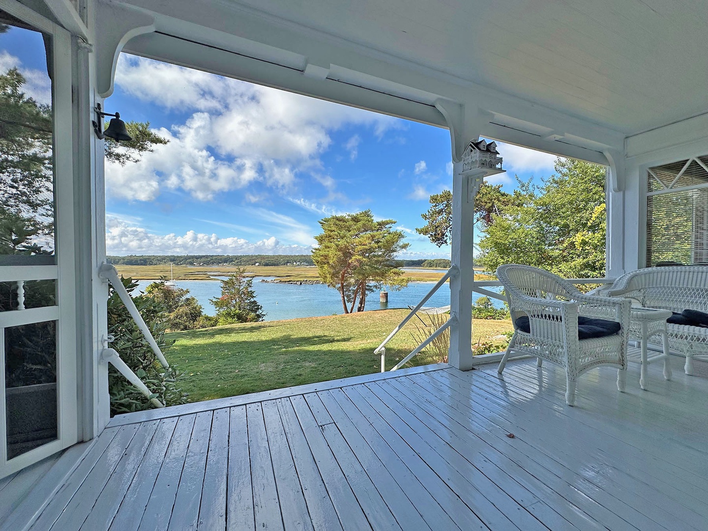 Step off the porch down to the spacious lawn.