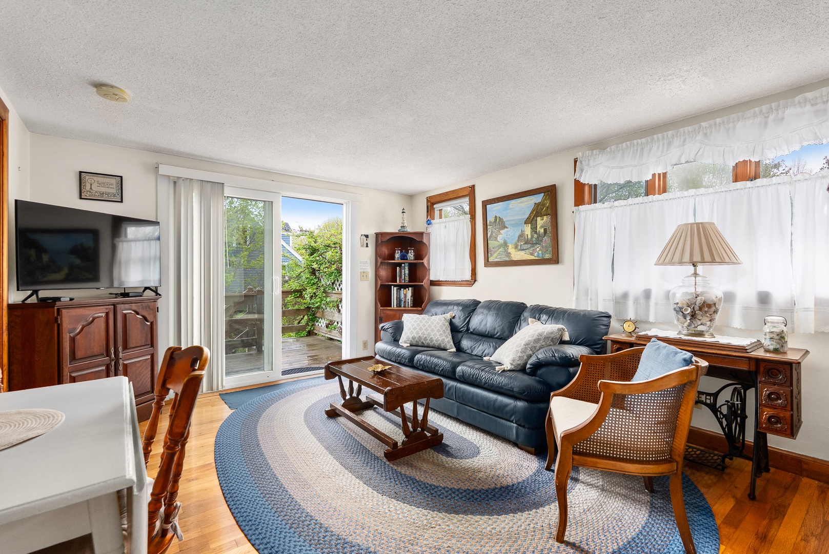 Living room with tv and comfortable seating.