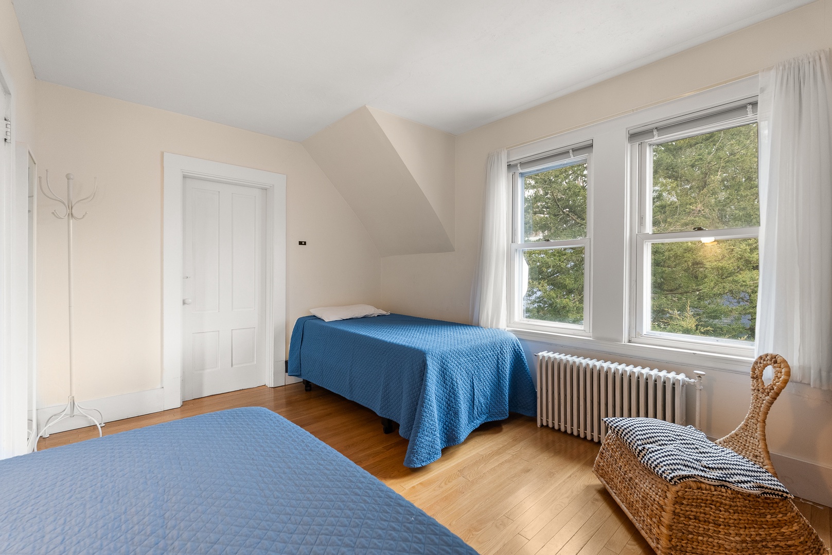 Bedroom 2: A sunny room with Twin beds.