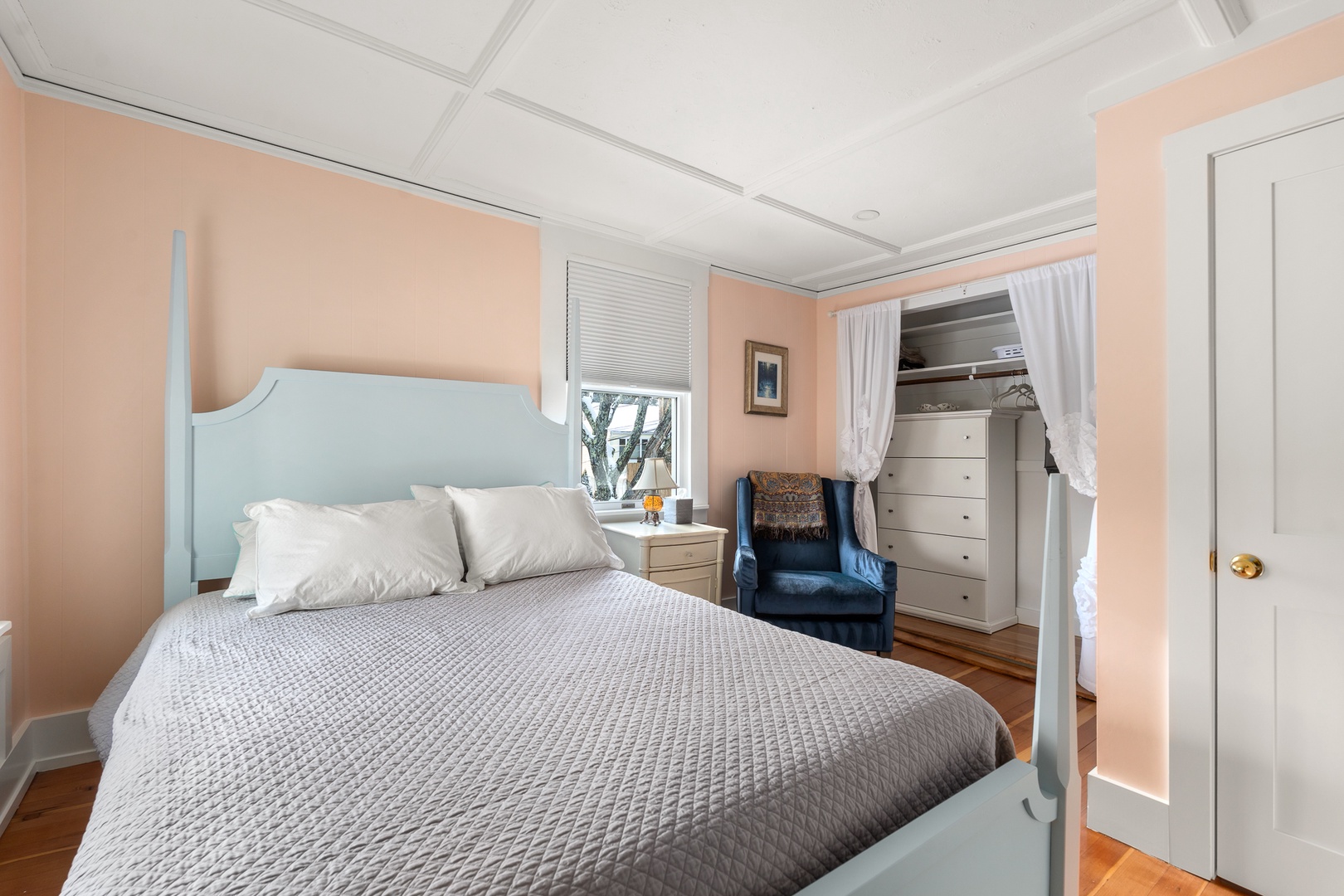 The second bedroom with a queen bed.