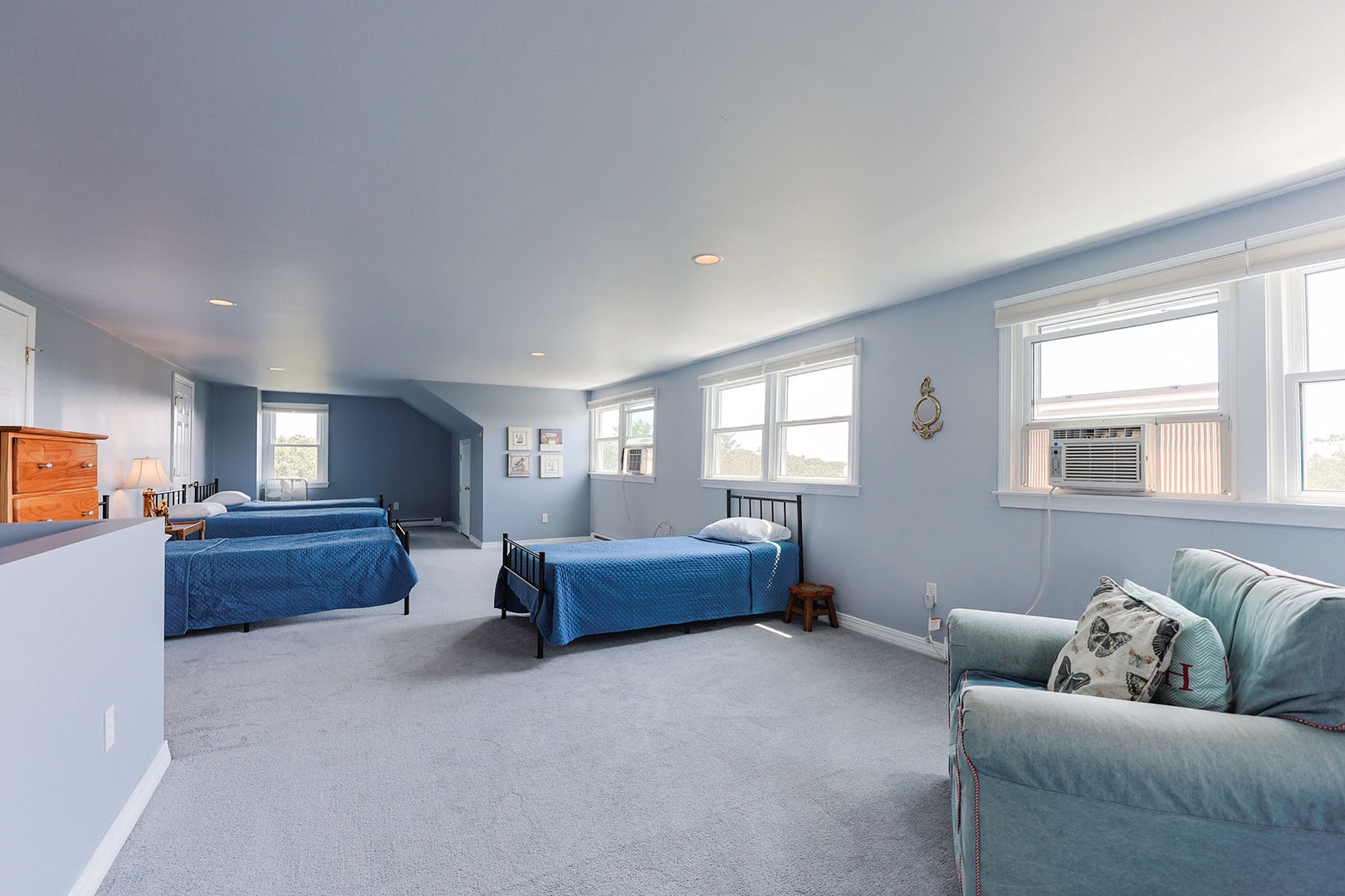 Bedroom 5: Twin beds and an ocean view.