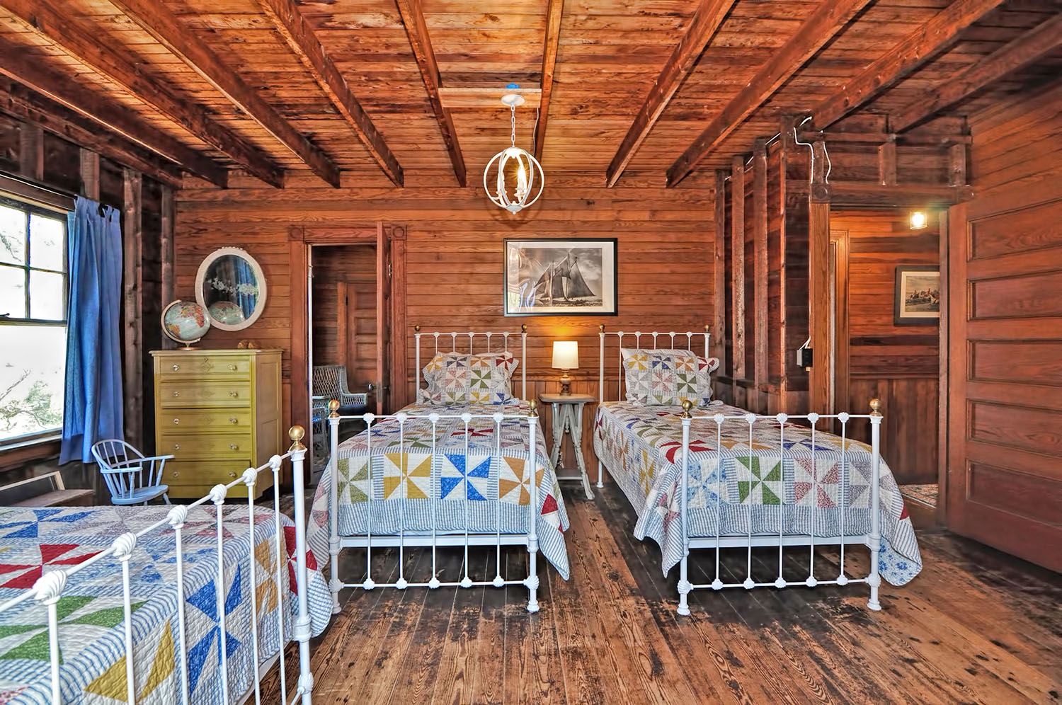 The Camp bedroom has two twin beds and an oversized single.