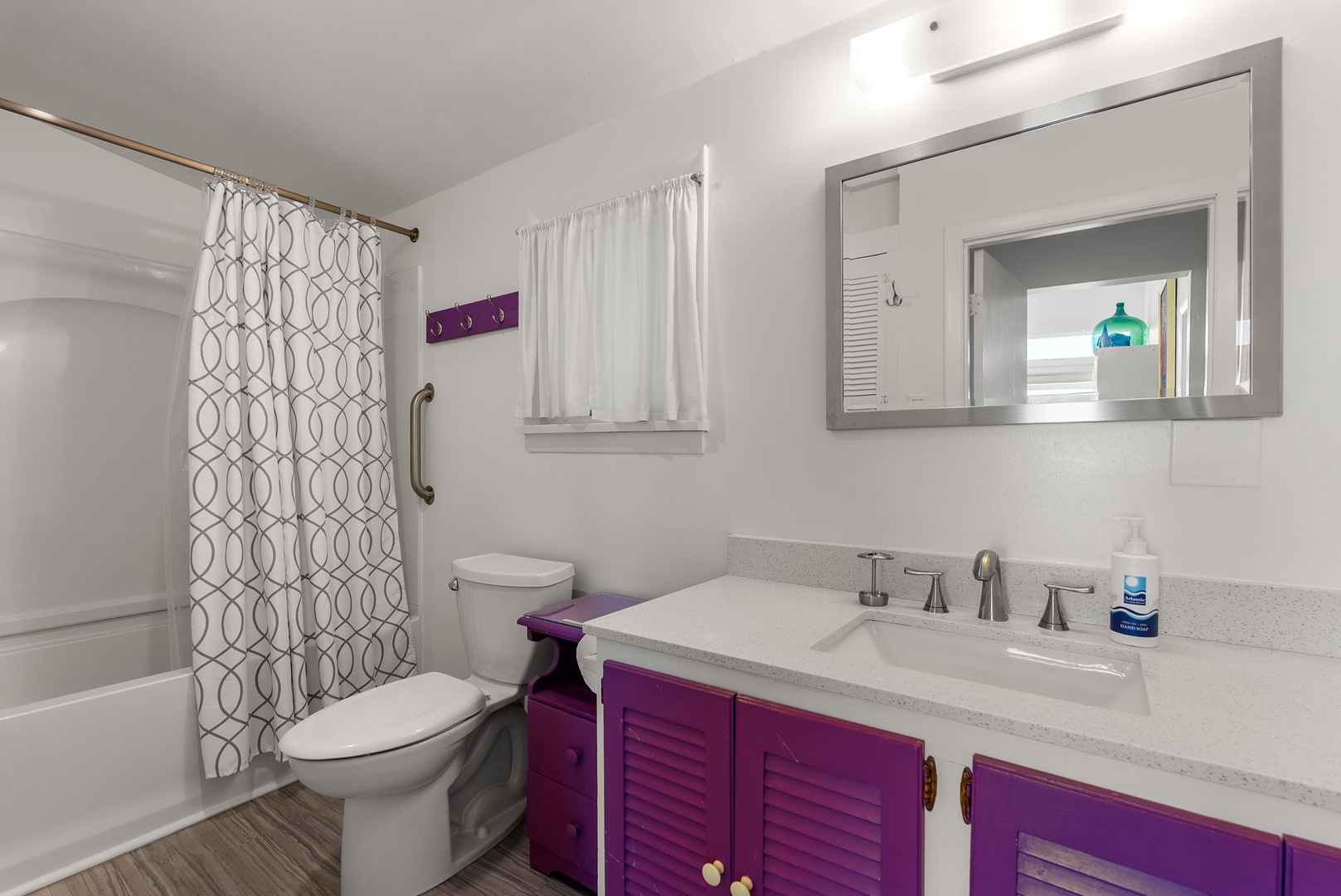 Second-floor full bath with tub/shower combo.