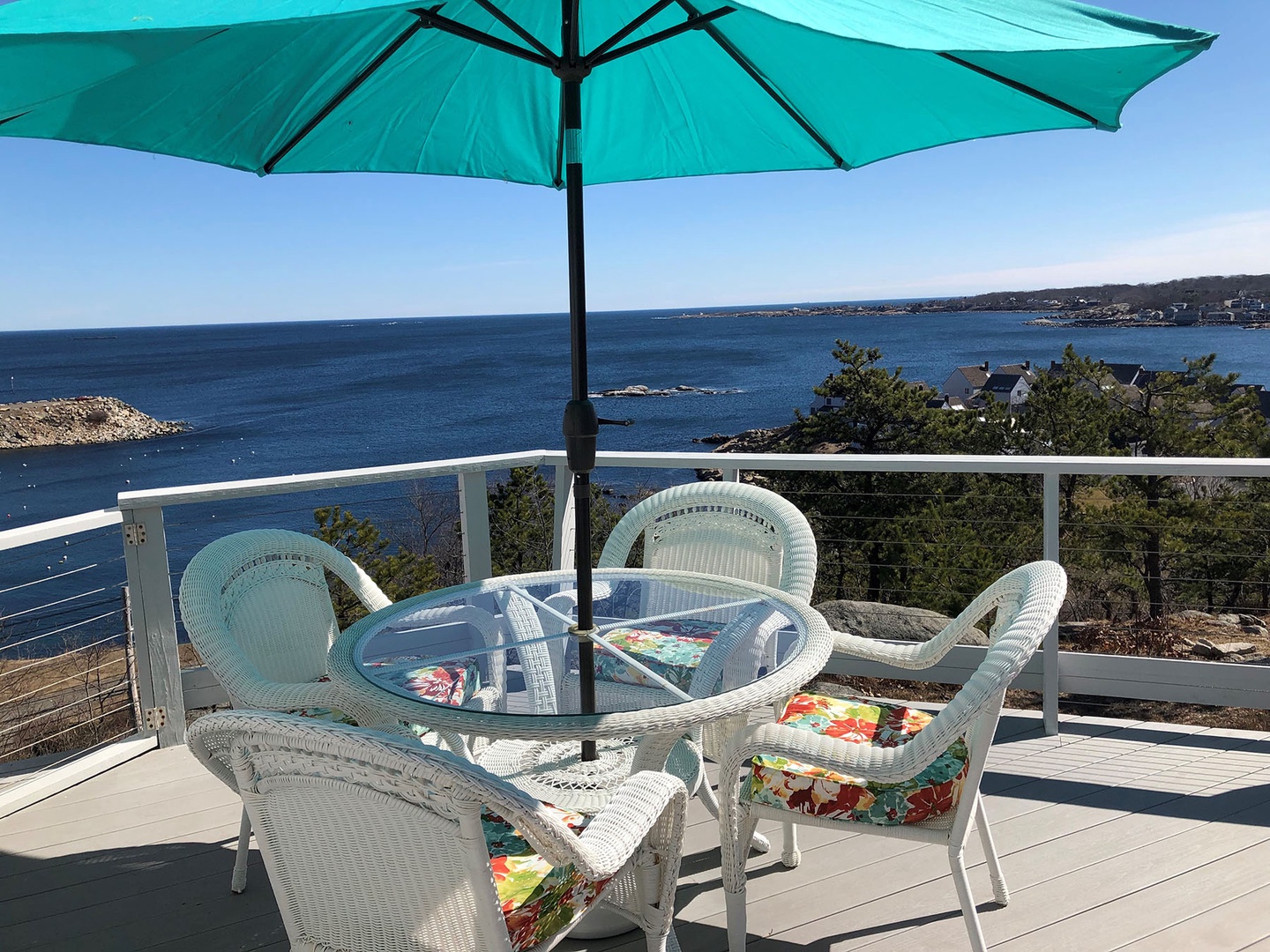 Dine outdoors while enjoying this ocean view of Rockport.